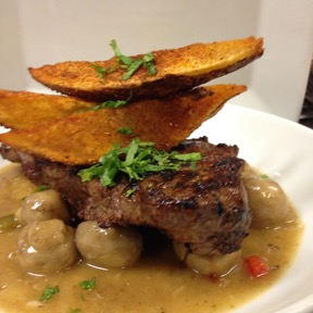 Grilled rib eye with roasted mushroom and gaucho fries